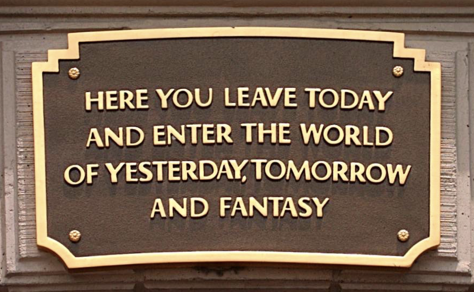 Photo of the plaque on Disneyland's entrance