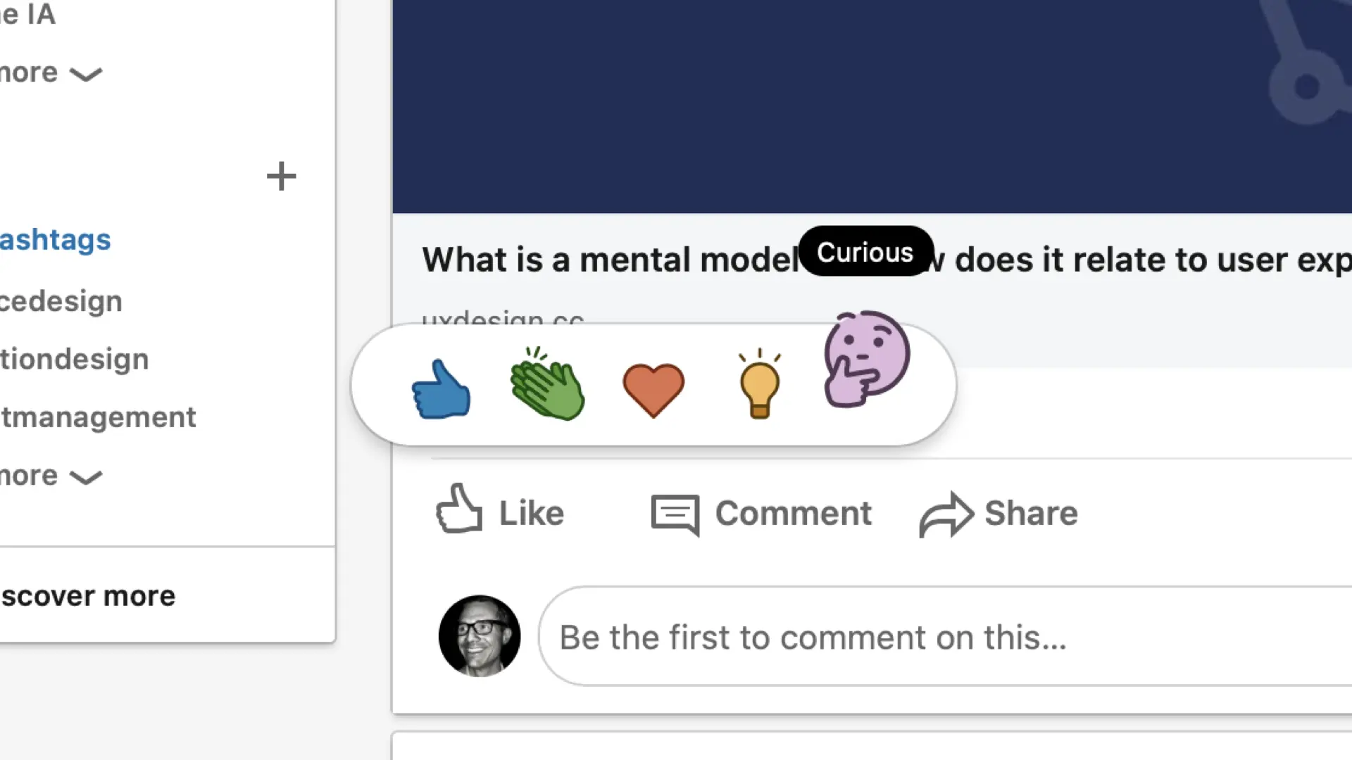 A close-up of a LinkedIn post with reaction options displayed, including a thumbs-up, a green clapping hands, a red heart, a yellow light bulb, and a purple face with a hand on the chin indicating thought or curiosity. The latter option is shown larger than the others.
