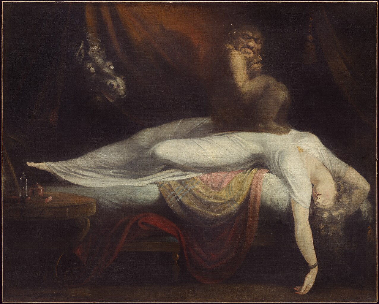 An oil painting of a woman in a white dress. She lies unconscious across a bed, her arm hanging down, while a dark, grotesque creature sits on her chest. In the shadows behind them, the head of a wide-eyed horse emerges. _The Nightmare_ (1781) by Henry Fuseli via [Wikimedia](https://en.m.wikipedia.org/wiki/The_Nightmare#/media/File%253AJohann_Heinrich_F%C3%BCssli_-_The_Nightmare_55.5.A-d1-2019-04-15.jpg)