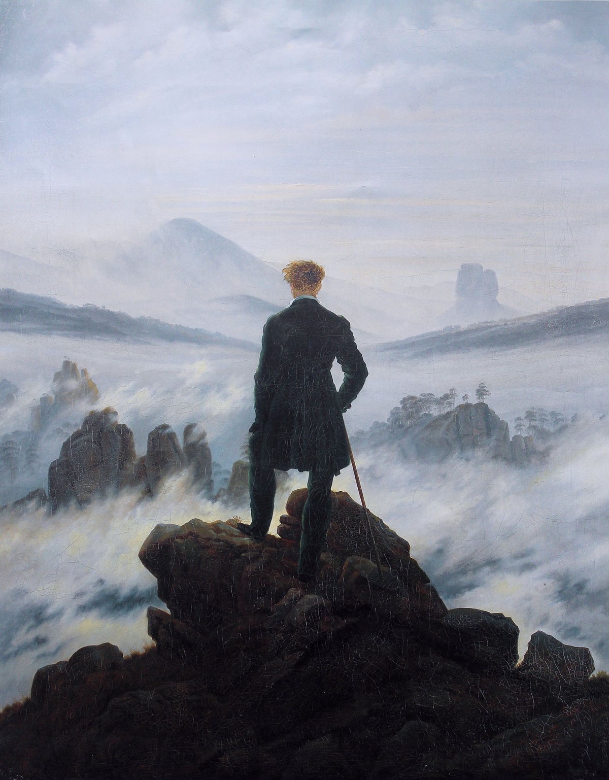 Painting of a man in a dark suit standing on a rocky peak, facing away and looking out over a vast, mist-covered landscape of mountains and cliffs under a pale sky. _Wanderer above the Sea of Fog_ (1818) by Caspar David Friedrich via [Wikimedia](https://en.wikipedia.org/wiki/Caspar_David_Friedrich#/media/File%3ACaspar_David_Friedrich_-_Wanderer_above_the_sea_of_fog.jpg)